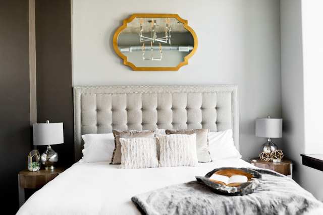 Mirror above bed